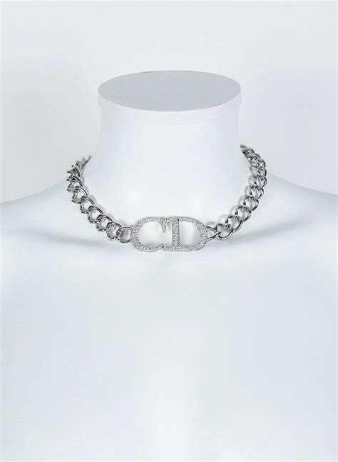 dior silver necklace d chain|christian Dior charm station necklace.